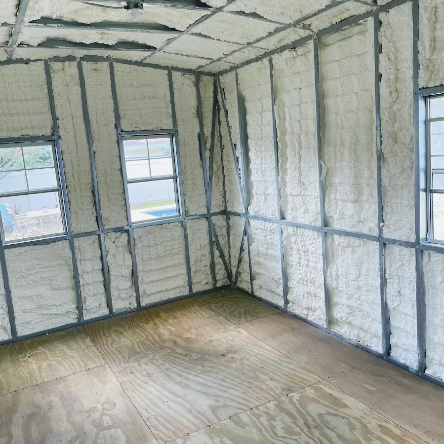 Closed-cell spray foam insulation applied to wall cavities in a residential project in Valley City